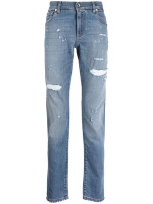 Dolce & Gabbana jean effet-usé à plaque logo - Bleu