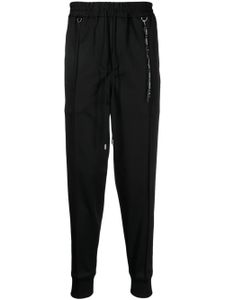 Mastermind World pantalon de jogging à logo imprimé - Noir