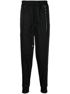 Mastermind World pantalon de jogging à logo imprimé - Noir