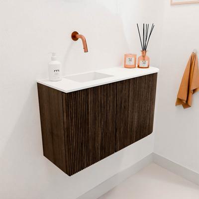 Toiletmeubel Mondiaz Joya | 71.6 cm | Meubelkleur Walnut | Faye wastafel Talc Links | Zonder kraangat(en) Toiletmeubel Mondiaz Joya | 71.6 cm | Meubelkleur Walnut | Faye wastafel Talc Links | Zonder kraangat(en)
