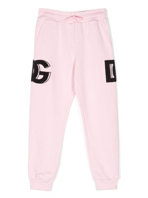 Dolce & Gabbana Kids pantalon de jogging à patch logo - Rose