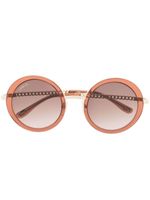 Lancel lunettes de soleil Adele à monture ronde - Tons neutres Lancel lunettes de soleil Adele à monture ronde - Tons neutres