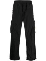 Stone Island pantalon fuselé à poches cargo - Noir