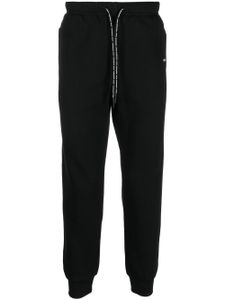 AAPE BY *A BATHING APE® pantalon de jogging à patch logo - Noir