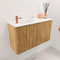 Toiletmeubel Mondiaz Joya | 70 cm | Meubelkleur Oak | Faye wastafel Talc Links | 1 kraangat Toiletmeubel Mondiaz Joya | 70 cm | Meubelkleur Oak | Faye wastafel Talc Links | 1 kraangat