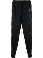 Mastermind Japan pantalon de jogging fuselé à bande logo - Noir