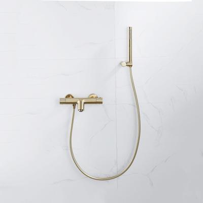 Fortifura Calvi Thermostatische badkraan met staafhanddouche, handdouchehouder en gladde doucheslang Geborsteld Messing PVD (Goud) SW720570/SW720567/SW720226/SW728176
