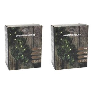 Set van 2x stuks kerst dennenslinger guirlande groen met verlichting 270 cm - Guirlandes