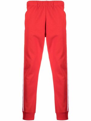 adidas pantalon de jogging à logo brodé - Rouge