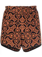 Marine Serre short de sport à imprimé graphique - Orange Marine Serre short de sport à imprimé graphique - Orange