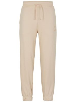 HUGO pantalon de jogging à logo embossé - Tons neutres
