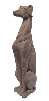 A RESIN FIGURINE OF A SITTING GREYHOUND