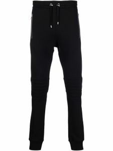 Balmain pantalon de jogging à logo embossé - Noir