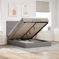 Ottoman bed met matras en LED's 140x190cm stof taupe