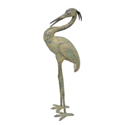 A BRONZE SCULPTURE OF A HERON