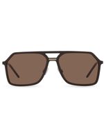 Dolce & Gabbana Eyewear lunettes de soleil oversize à logo gravé - Marron