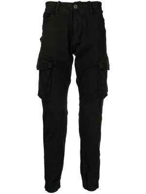 Alpha Industries pantalon fuselé à poches cargo - Noir