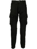 Alpha Industries pantalon fuselé à poches cargo - Noir