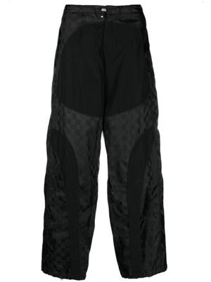 MISBHV pantalon ample à motif monogrammé - Noir
