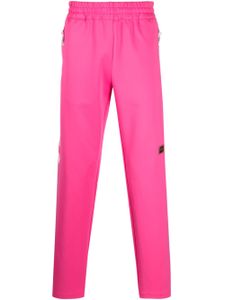 Advisory Board Crystals pantalon de jogging droit à patch logo - Rose