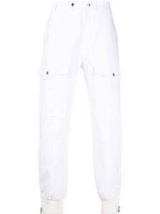 Alexander McQueen pantalon fuselé à poches cargo - Blanc