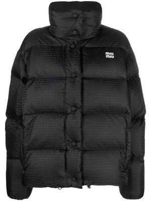 Miu Miu doudoune à logo imprimé - Noir