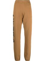 Heron Preston pantalon de jogging à logo imprimé - Marron