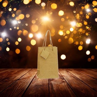 Set van 12x stuks luxe gouden papieren giftbags/tasjes met glitters 12.5 x 20 cm