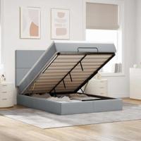 Ottoman bed met matras en LED's 140x190cm stof lichtgrijs