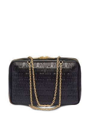 Miu Miu sac à main en cuir à logo embossé - Noir