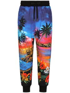 Dolce & Gabbana pantalon de jogging à imprimé tropical - Bleu