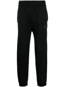 A-COLD-WALL* pantalon de jogging en polaire à patch logo - Noir