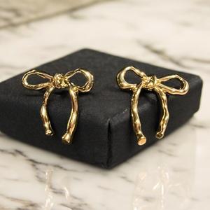 Strikjes Oorbellen - Sieraden - Spiritueelboek.nl
