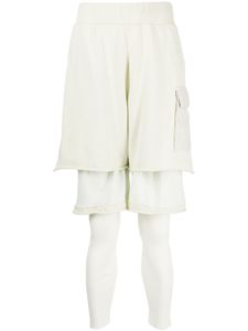 Undercover pantalon en coton à design superposé - Blanc