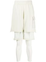 Undercover pantalon en coton à design superposé - Blanc Undercover pantalon en coton à design superposé - Blanc