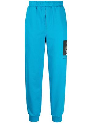 Helmut Lang pantalon de jogging à imprimé photographique - Bleu