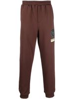 Helmut Lang pantalon de jogging fuselé à patch logo - Marron