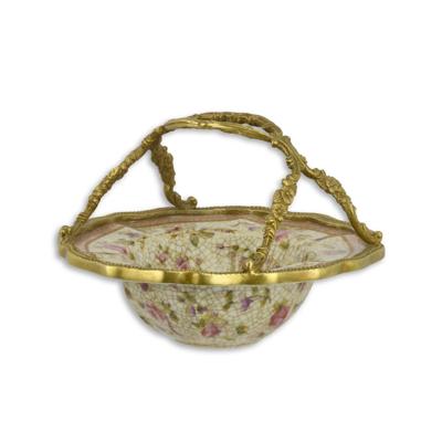 A BRONZE MOUNTED PORCELAIN BASKET