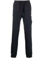 Stone Island pantalon de jogging fuselé en polaire - Bleu