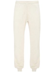 JW Anderson pantalon de jogging en coton à slogan brodé - Blanc