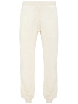 JW Anderson pantalon de jogging en coton à slogan brodé - Blanc