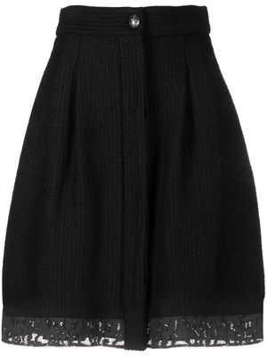CHANEL Pre-Owned jupe en tweed bordée de dentelle (années 2000) - Noir