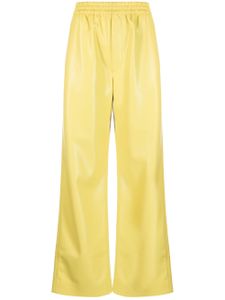 Nanushka pantalon en cuir artificiel - Jaune