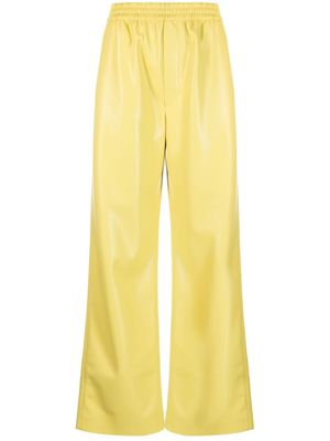 Nanushka pantalon en cuir artificiel - Jaune