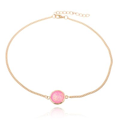 Korte verstelbare goudkleurige Bohemian ketting met roze steen