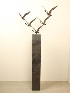 5 bronzen zwanen