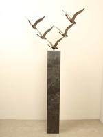 5 bronzen zwanen