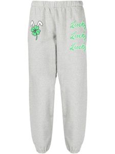 Natasha Zinko pantalon de jogging à imprimé Lucky - Gris