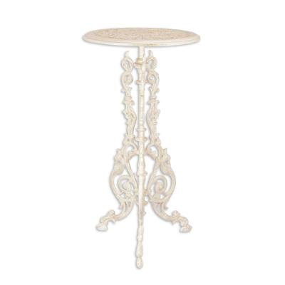 A CAST IRON PLANT TABLE, WHITE