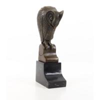 A BRONZE SCULPTURE OF AN OWL